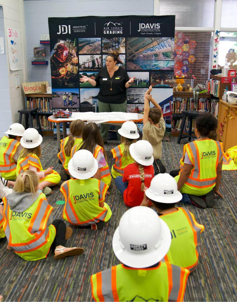 Kids in front of a teacher